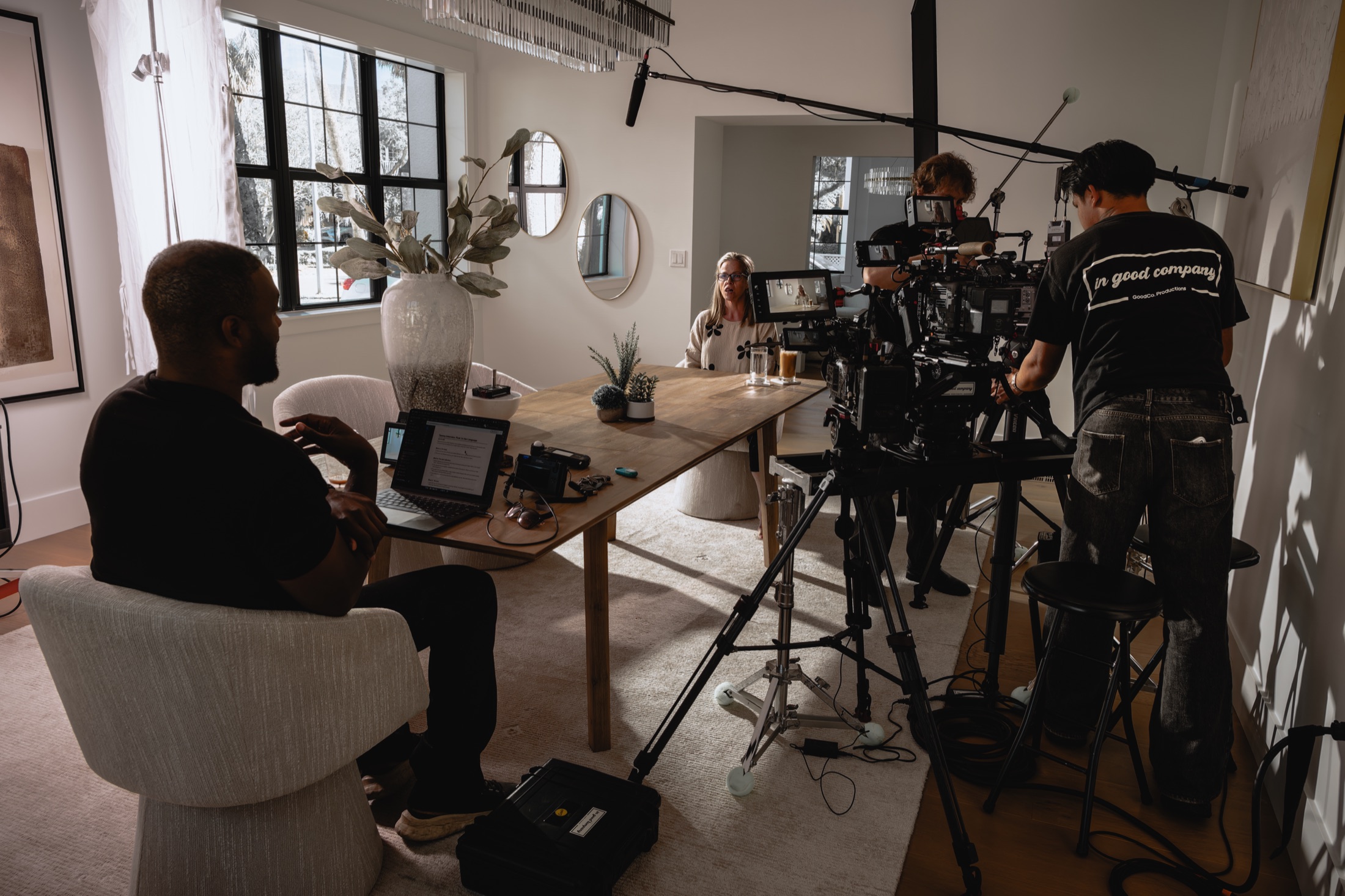 Dee Mount directing a Mount Up Media documentary shoot on location, cinema rig and crew at work.