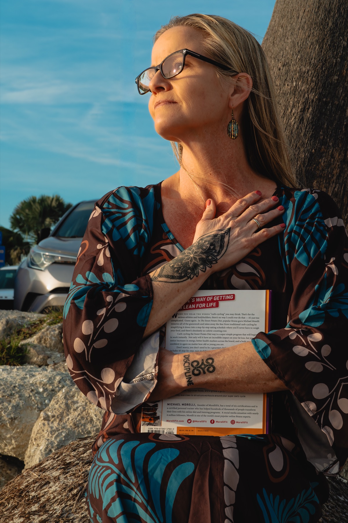 A real FitScript client, photographed on location at golden hour during a Still Standing production.